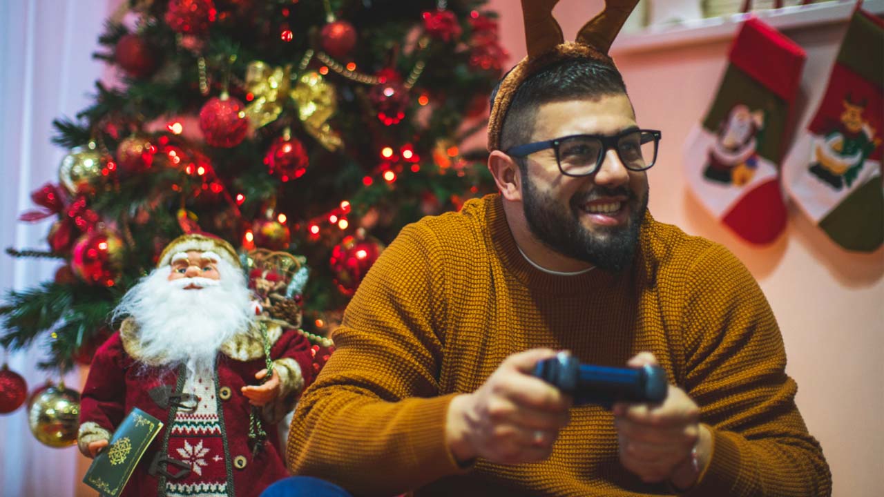 Poradnik prezentowy dla gracza - mężczyzna gra w grę